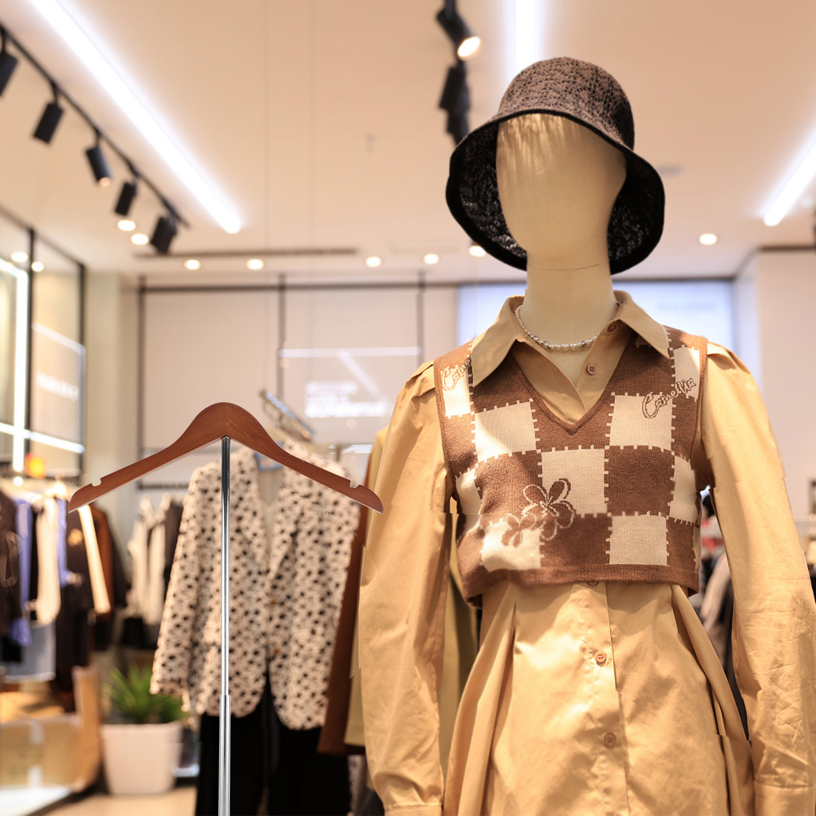 T-förmiger Kleiderständer mit  – Baby Clothing Stores Bewertung und Preis